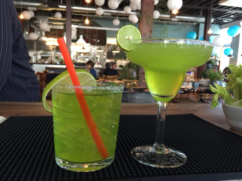 Green cocktails at the bar